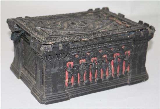 A Staunton ebony and boxwood chess set by Jaques of London, in carton pierre casket, (a.f.).